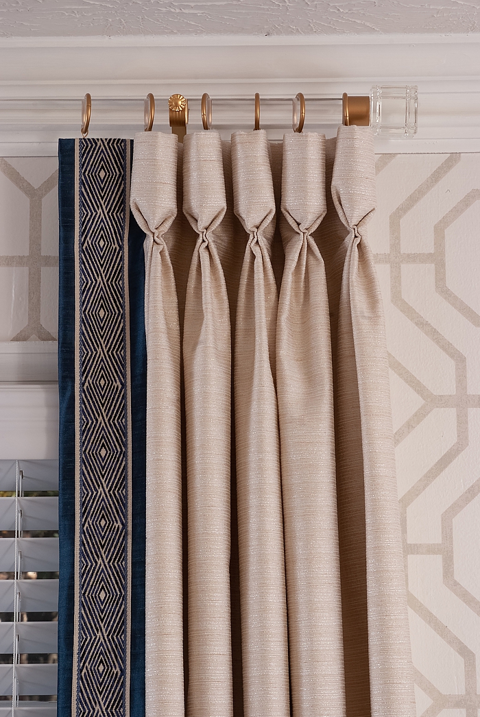 Custom draperies add form and function to any room as well as being practical.