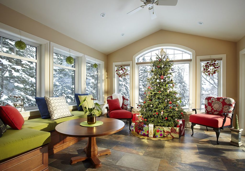 Keep space free in the main part of the house by moving the Christmas tree to an all-season wall