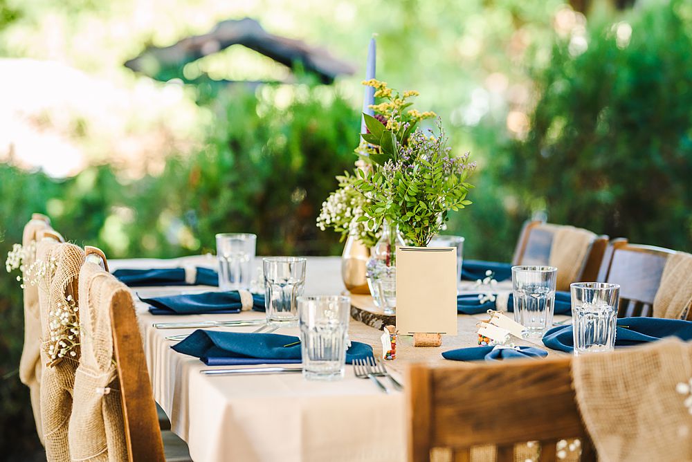 A classic tablescape for Fall entertaining with contrasting teal against the soft orange hues.